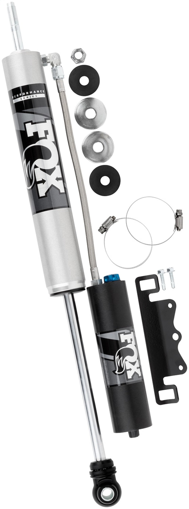 Introducing the FOX 2005+ Ford Super Duty 2.0 Perf Series 9.6in Smooth Body Remote Reservoir Front Shock - CD Adj, a performance-focused shock absorber kit designed for exceptional off-road capability. Featuring a sleek silver shock with a black reservoir adorned with the logo, this kit includes corrosion-resistant mounting brackets, washers, screws, and cables. Elegantly displayed against a white background, it embodies both functionality and style.