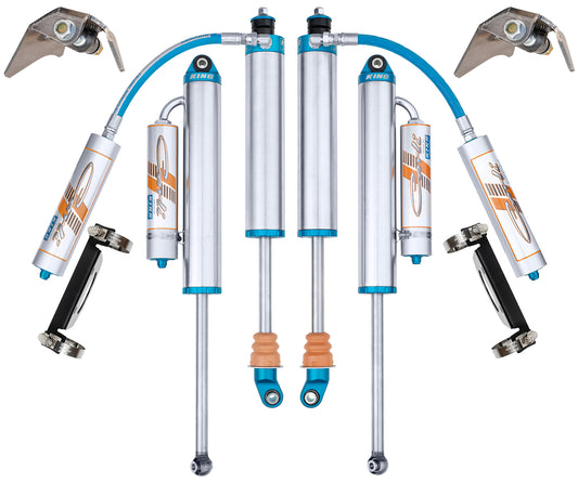 The image displays a Carli Suspension shock set specifically crafted for 2017-2023 Ford F-250/F-350 (4WD) vehicles. The shock absorbers and coilover shocks are elegantly arranged, showcasing the Carli Tuned King 3.0" Remote Reservoir & Piggyback 4.5" Lift features, highlighted by blue accents with brand logos and flexible hoses connecting to the main cylinders.