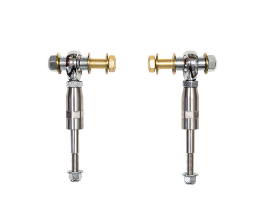 Two metal components with adjustable rods featuring spherical rod ends and bolts, branded as Carli Suspension's 94-98 Dodge RAM 2500/3500 (4WD) Extended Sway Bar End Links, 2nd Gen 12V. These components display a polished metallic finish in gold and silver tones, set side by side on a white background.