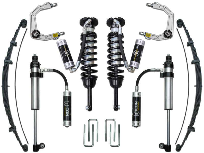 Picture of the ICON Stage 8 Suspension System for Toyota Tacoma, showcasing billet aluminum upper control arms and a robust high-angle Delta Joint, paired with shock absorbers, coil springs, and leaf springs. The components are arranged symmetrically with elegant metal finishes highlighted by black and silver details.