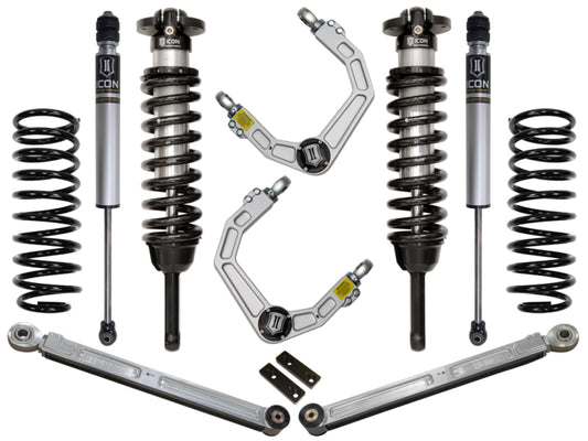 A set of ICON suspension components for the 2010+ Toyota FJ/4Runner, specifically the Stage 3 Suspension System with Billet Upper Control Arms, is displayed against a white background. The components are arranged symmetrically and showcase a combination of black and silver hues. They are designed to be highly resistant to corrosion and incorporate advanced Delta Joint technology for enhanced performance.