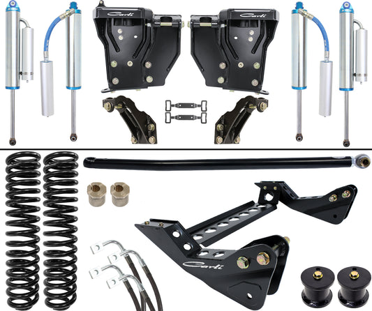 Explore the Carli Suspension 11-16 Ford F-250/F-350 (4WD) DIESEL 4.5" Lift Dominator System for your vehicle, featuring coil springs, shock absorbers, and black metal brackets. The components are expertly arranged with precise connecting hardware and striking blue detailing, ensuring optimal performance with Carli King 3.0” shocks.