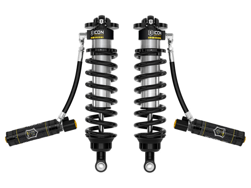 The ICON 22-23 Toyota Tundra 3.0 Series Shocks VS RR CDEV Coilover Kit includes two black coilovers with attached reservoirs designed for automotive use. Featuring coiled springs and high-quality finishes, this kit incorporates ICON’s Intelligent Control system with Compression Damping Electronic Valves (CDEV) and displays the brand markings on the reservoirs.