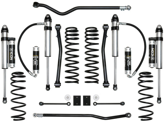 A meticulously arranged set of ICON 2018+ Jeep Wrangler JL 2.5in Stage 5 Suspension System components showcased symmetrically on a white background. The set includes coil springs, shock absorbers, and link bars engineered for optimal ride quality. These components primarily feature black and silver finishes with the ICON brand visible on select parts.