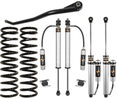 The Carli Suspension 13-23 Ram 3500 (4WD - Leaf) Diesel 2.5" Lift Carli-Spec Backcountry Leveling System is a suspension kit designed for off-road use, providing a lift of 2.5 inches with two coil springs, four shock absorbers equipped with attached reservoirs, a track bar, and mounting brackets. Components are neatly arranged on a white background.