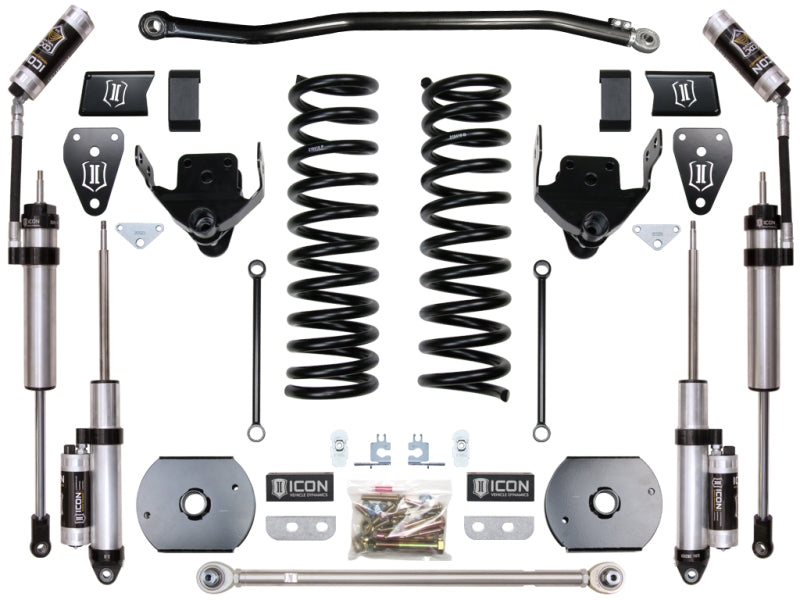 The ICON 2014+ Ram 2500 4WD 4.5in Stage 3 Suspension System, featuring springs, remote reservoir shocks, brackets, and additional components, is arranged against a white background.