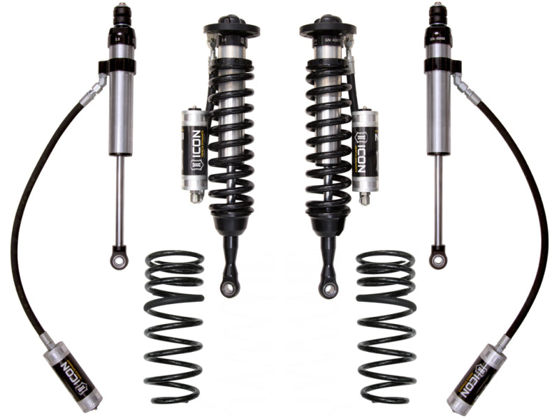 Image showcasing the ICON 2008+ Toyota Land Cruiser 200 Series 1.5-3.5in Stage 2 Suspension System by ICON, featuring a pair of coilovers, two shock absorbers with external reservoirs, and two distinct springs. Ideal for off-road vehicle enthusiasts, these components are symmetrically arranged against a white backdrop to emphasize the suspension upgrade.