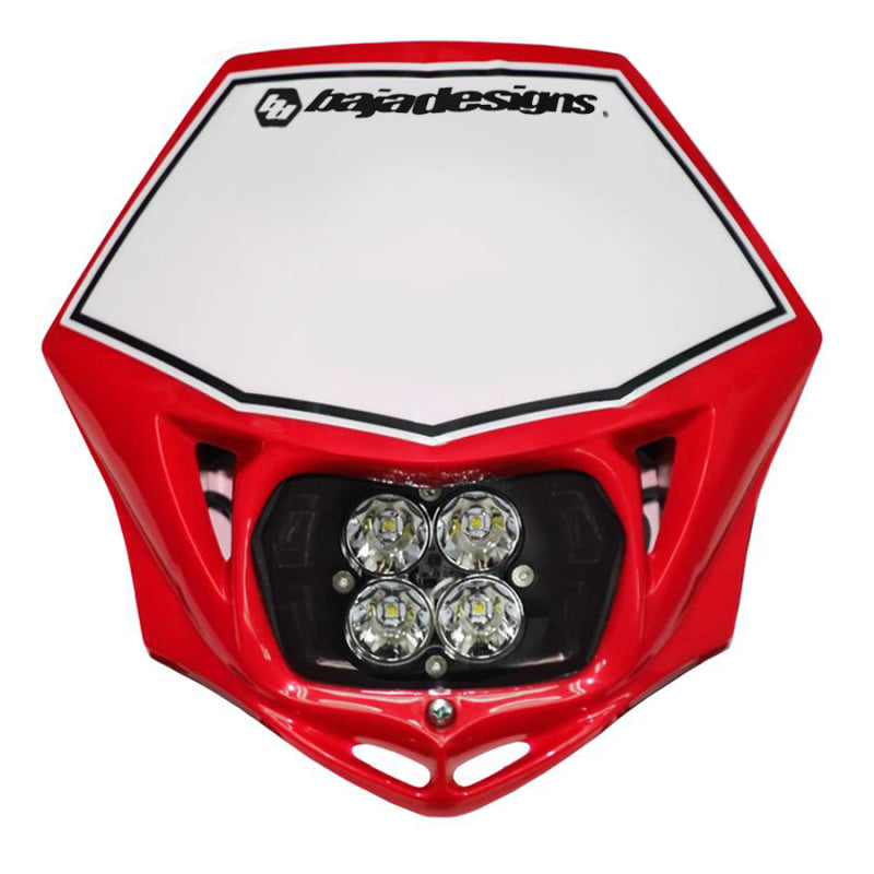 A Baja Designs Motorcycle Race Light LED DC Red Squadron Sport headlight assembly features a red and white off-road design with four central circular Squadron Sport LED lights, ideal for high-intensity motorcycle race lighting needs.