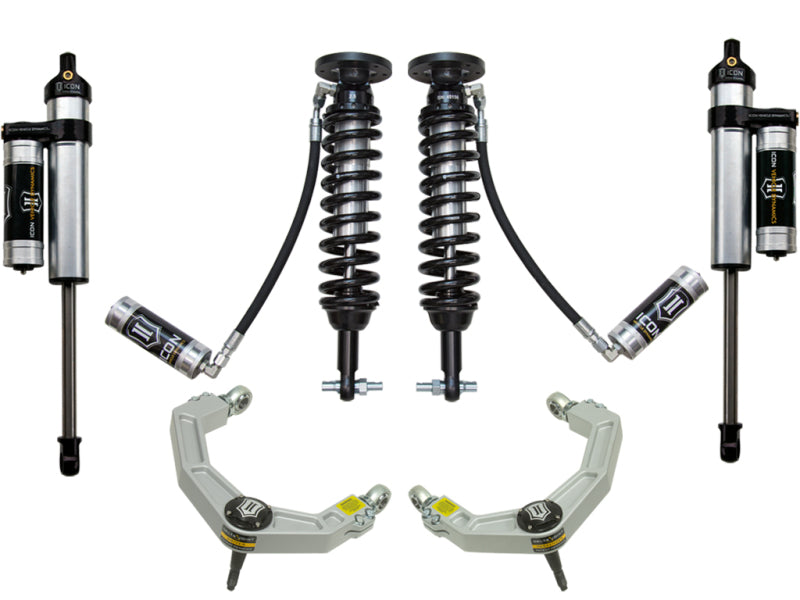 A set of the ICON 2014 Ford F-150 4WD Stage 4 Suspension System, featuring two coilover shock absorbers, two remote reservoir shocks, and billet upper control arms with high angle ball joints from ICON, arranged symmetrically on a white background.