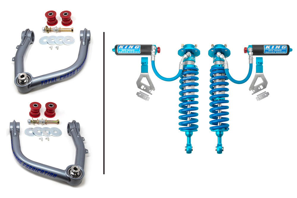 The TOTAL CHAOS 22-23 Toyota Tundra Lift Kit with King 2.5 Adjustable Front Shocks includes upper control arms with red bushings and additional hardware, displayed on the left side separated by a black line from a pair of blue off-road racing coilover shocks with remote reservoirs and mounting brackets on the right, making it an excellent choice for pairing with an off-road suspension lift kit.