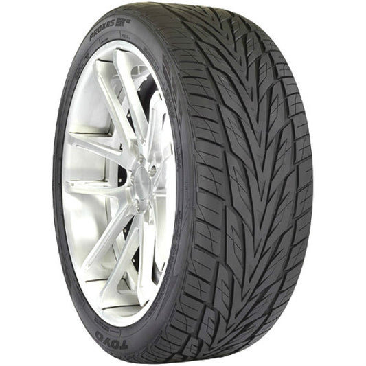 The TOYO Proxes ST III Tire, with a size of 285/50R20 116V, offers an intricate tread design for improved grip and stability. This high-performance tire showcases a black rubber surface rich in textures, beautifully accentuating its elegant silver alloy wheel.