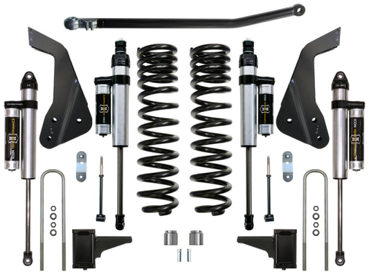 An ICON 05-07 Ford F-250/F-350 4.5in Stage 3 Suspension System displaying dual-rate front coil springs, four ICON 2.5 Aluminum Series shocks, mounting brackets, and an assortment of hardware components, all symmetrically arranged against a white background.