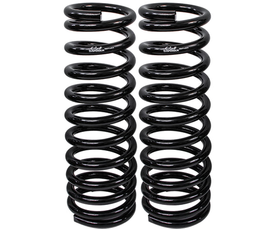 A pair of black metal coil springs, manufactured by Carli Suspension and designed for a 6" lift on a 03-13 Dodge RAM 2500/3500 Diesel (4WD), stand vertically side by side against a white background. These multi-rate coil springs feature a tightly wound design with a shiny finish and are identical in size and shape.