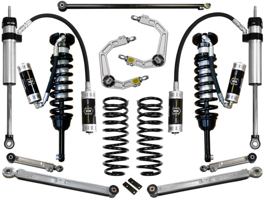 An ICON set of automotive suspension components, named the 2010+ Toyota FJ/4Runner 0-3.5in Stage 6 Suspension System w/Billet Uca, showcases upper control arms and heavy-duty high-angle ball joints, complete with coilover shocks, springs, and other metal parts arranged symmetrically on a white background.