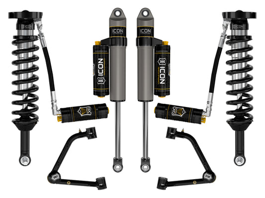 The ICON 2023 Chevrolet Colorado Stage 5 Suspension System, featuring shock absorbers, coil springs, Delta Joint PRO upper control arms, and reservoirs, is symmetrically displayed on a white background.