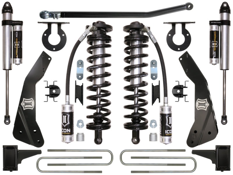 The ICON 11-16 Ford F-250/F-350 4-5.5in Stage 3 Coilover Conversion System, featuring components like coil springs, shock absorbers, and mounting hardware from the ICON brand, is arranged neatly against a white background. These black and metallic parts are perfectly suited for Ford Super Duty models and showcase visible branding on several pieces.