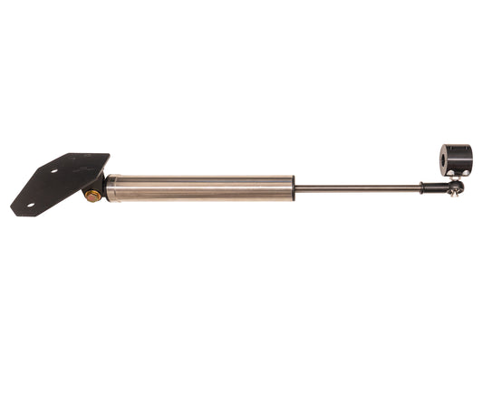 This cylindrical metal shock absorber, featuring a smooth steel rod and an angled black mounting bracket, serves as a steering stabilizer. It closely resembles the precision of Carli Suspension's 03-13 Dodge RAM 2500/3500 (4WD) Stainless Steel High Mount Stabilizer - T-Style, designed for a 3-6" lift.