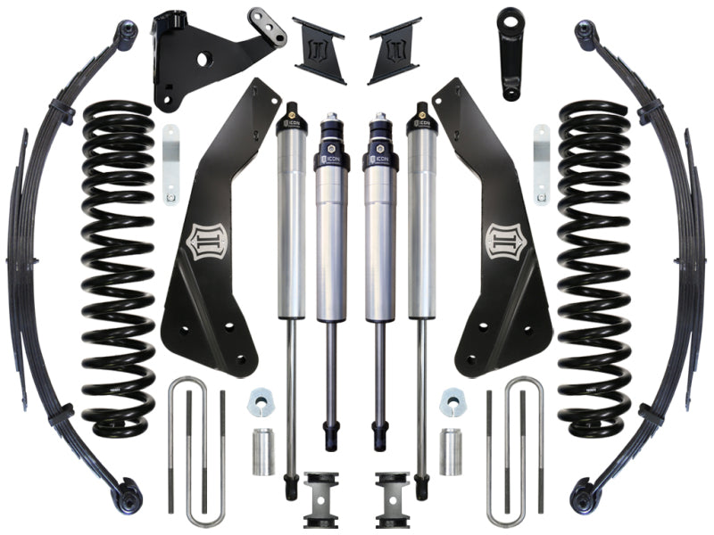 Image of an ICON 11-16 Ford F-250/F-350 7in Stage 3 Suspension System by ICON, showcasing lift dual rate coil springs, shock absorbers, control arms, and various mounting brackets and hardware, all arranged neatly against a white background.