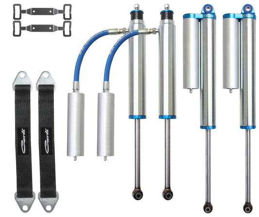 Image of the Carli Suspension Tuned King 2.5" Remote Reservoir Shock Package, tailored for the 10-13 Dodge Ram 2500/3500 (4WD) Diesel. The package includes a set of four suspension shock absorbers with attached reservoirs, two black straps, and metallic mounting brackets. The shocks feature blue accents and connected hoses, perfect for a 3" lift.