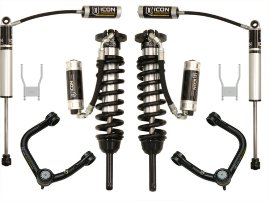 A set of ICON 05-11 Toyota Hilux 0-3in Stage 5 Suspension System w/Tubular UCA components, comprised of two remote reservoir coilovers, two shock absorbers, and two control arms, is displayed on a plain white background.