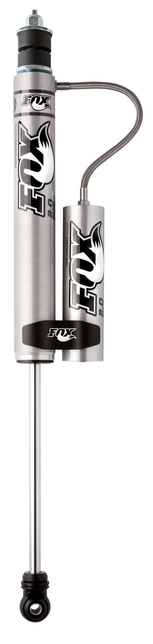 The FOX 05+ Ford SD 2.0 Performance Series 8.6in. Smooth Body Remote Reservoir Front Shock for a 0-1.5in. lift is a silver absorber that delivers exceptional off-road capability. Adorned with the Fox logo on its aluminum bodies and reservoir, it features a black bushing at the bottom and includes a flexible hose connecting the reservoir to the main body for optimized performance shock valving.