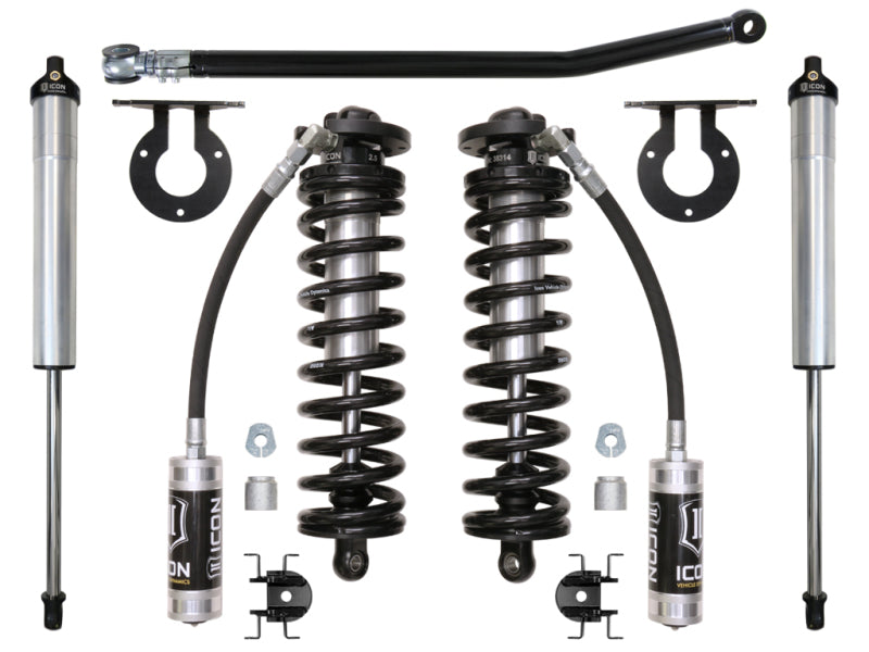 The ICON 05-16 Ford F-250/F-350 2.5-3in Stage 2 Coilover Conversion System, by ICON, is elegantly showcased on a white background. It includes two coil-over shocks, remote reservoirs, mounting brackets, and hardware components, making it ideal for F-250 and F-350 trucks looking to boost their performance.