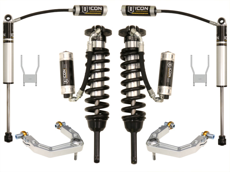 The image displays the ICON 12-15 Toyota Hilux 0-3in Stage 5 Suspension System with Billet UCA, including coilover shocks, shock absorbers, and control arms. Neatly arranged on a white background, these components are designed to elevate your Toyota Hilux's off-road capabilities.