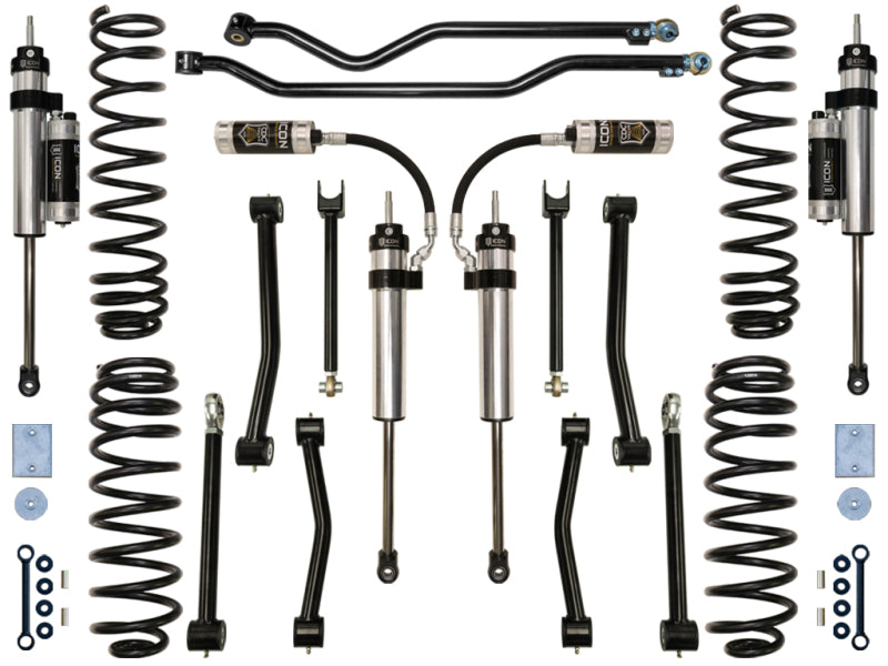 A selection of ICON vehicle suspension components, including coil springs, shock absorbers, sway bar links, and mounting hardware from the ICON 07-18 Jeep Wrangler JK 3in Stage 5 Suspension System is displayed on a white background.