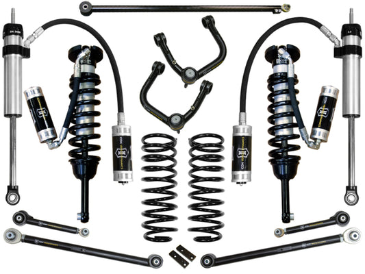 Image showcasing various components of the ICON 2010+ Toyota FJ/4Runner 0-3.5in Stage 6 Suspension System with Tubular UCA by ICON, featuring corrosion-resistant coil springs, shock absorbers with reservoirs, and upper control arms equipped with the Delta Joint, alongside other connecting rods, all set against a white background.