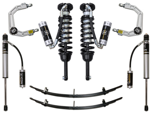 The ICON 05-15 Toyota Tacoma Stg 4 Suspension System, incorporating advanced Delta Joint technology, includes two coilover shocks, billet upper control arms, leaf springs, and additional shock absorbers symmetrically displayed on a white background.