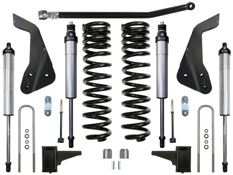 The image features the ICON 05-07 Ford F-250/F-350 4.5in Stage 2 Suspension System, showcasing large black Dual-Rate coil springs, four silver shock absorbers, two black mounting brackets, and various metal bolts, brackets, and rods arranged symmetrically on a white background.