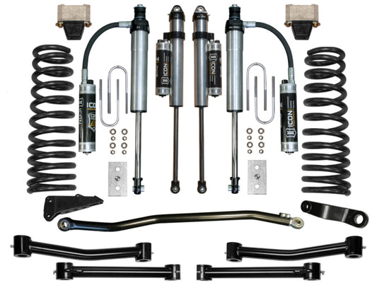 Image showcasing the ICON 09-12 Ram 2500/3500 4.5in Stage 5 Suspension System, including ICON 2.5" Series shocks, coil springs, brackets, and control arms. Components are meticulously arranged to emphasize the various parts included in the kit.