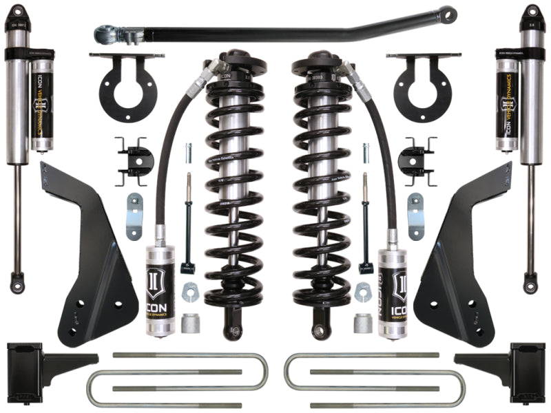 A well-organized display features height-adjustable automotive suspension components, such as coilover shocks, brackets, and hardware, all bearing the "ICON" label. These components are symmetrically arranged on a white background and are ideal for upgrading or converting the suspension of Ford Super Duty vehicles. This display showcases the ICON 05-07 Ford F-250/F-350 4-5.5in Stage 3 Coilover Conversion System.