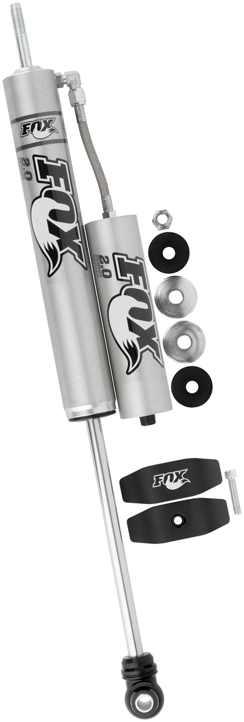 The FOX 14+ Dodge 2500 2.0 Performance Series 10.1in. Smooth Body R/R Front Shock for a 4-5in lift features performance-driven shock valving that guarantees fade-resistant performance. It includes the necessary mounting hardware and brackets, presented against a white background, offering unparalleled precision to enhance your off-road capabilities.