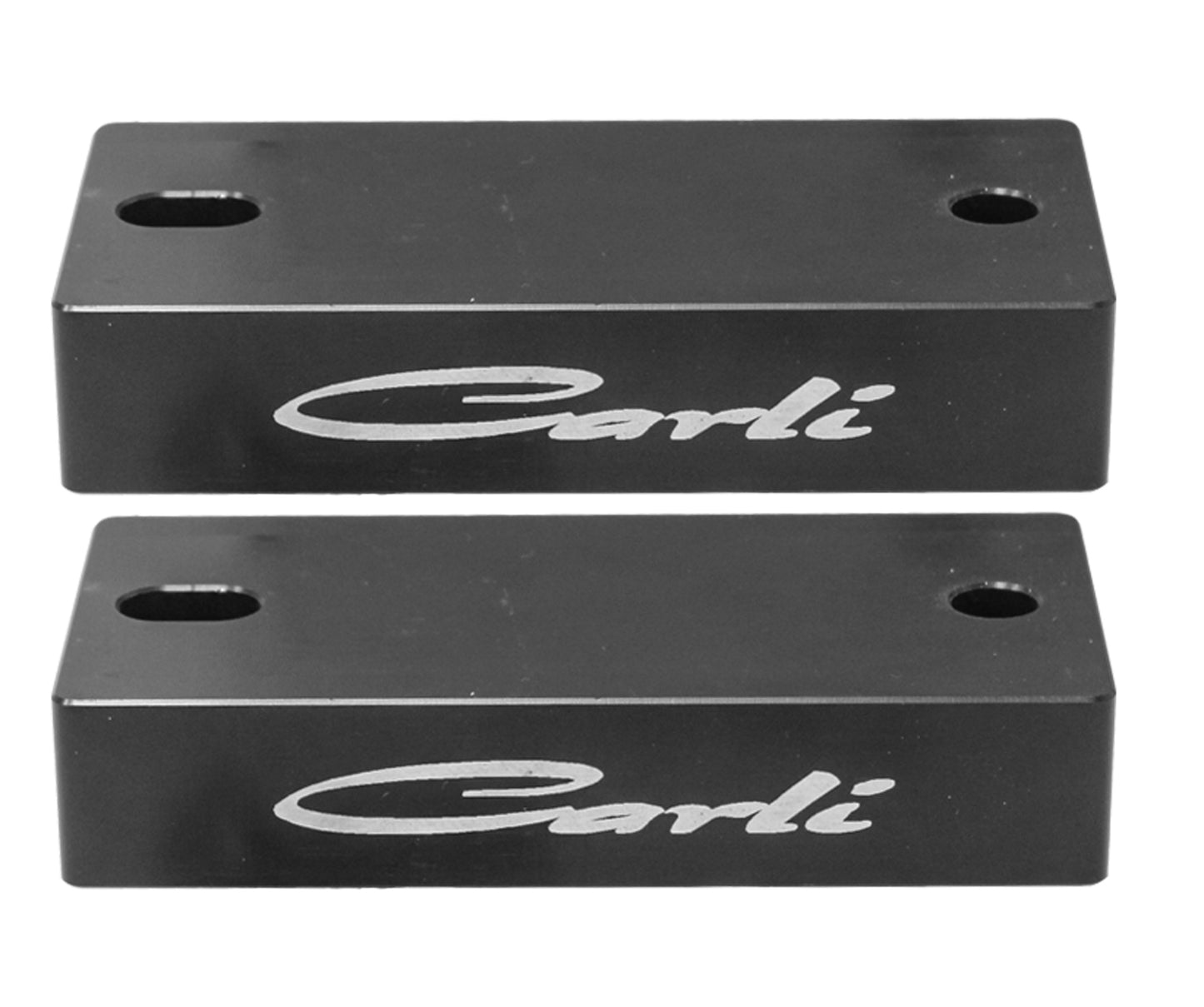 Two rectangular metal blocks in black, each with the brand name "Carli Suspension" printed in white and rounded corners, are aligned parallel. Designed for easy mounting with a hole near one edge, these components resemble bump stops included in the 14-23 Ram 2500 (4WD - Air/Air) 1" Rear Bumpstop Drop kit.