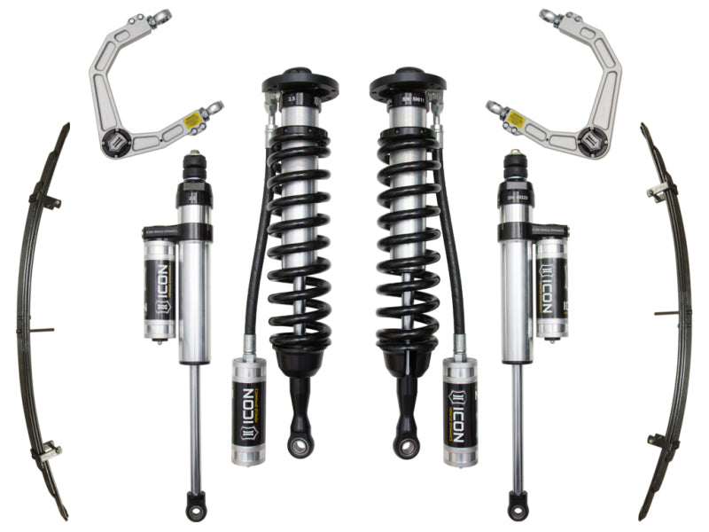 The ICON 2007+ Toyota Tundra 1-3in Stage 5 Suspension System w/Billet UCA, showcasing the ICON logo, features a collection of off-road suspension components such as two coil-over shocks, two Delta Joint upper control arms, and two leaf springs. These parts are symmetrically arranged against a white background.