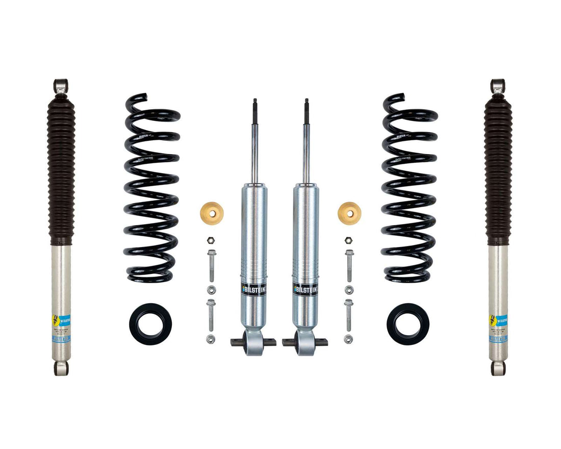 The LTW Motorsports 21-23 Ford F-150 Leveling Kit with Bilstein 6112 Struts and 5100 Shocks includes two coil springs, two shock absorbers, and various small components arranged symmetrically. The shock absorbers have a sleek metallic finish, while the springs are elegantly black.