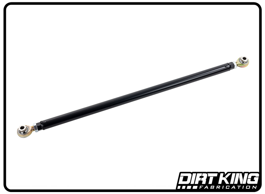 The Dirt King 09-18 RAM 1500 Rear Track Bar, crafted from chromoly tubing and designed for automotive use, features heavy-duty rod ends on both sides. Displayed against a white background, the bottom right corner showcases the DIRT KING Fabrication logo.