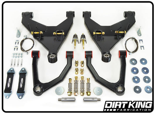 A comprehensive set of suspension system components for off-road vehicles, specifically the 07-09 Toyota FJ Cruiser Long Travel Kit by DIRT KING, includes upper and lower control arms, bolts, washers, brackets, and other hardware. The parts are neatly arranged on a white background with the Dirt King Fabrication logo displayed in the bottom-right corner.