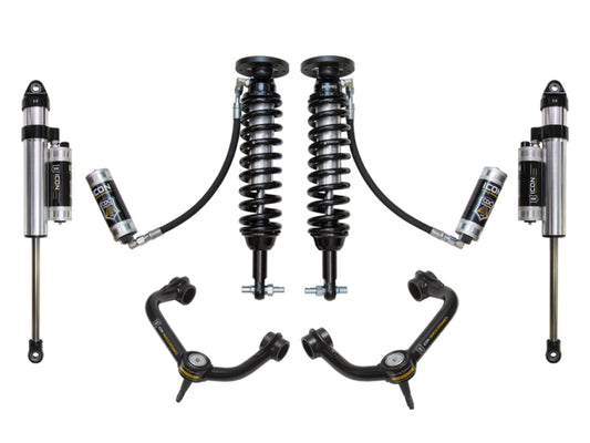 The ICON 2014 Ford F-150 4WD 1.75-2.63in Stage 5 Suspension System w/Tubular Uca by ICON showcases two coilover shocks, two additional shock absorbers with attached reservoirs, and upper control arms featuring a Delta Joint, all symmetrically arranged against a white background.