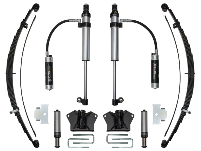 The image displays the ICON 2007+ Toyota Tundra RXT Stage 2 System, which includes shock absorbers, leaf springs, and related mounting hardware. These components are symmetrically arranged on a white background, showcasing their robust design with metallic black and silver finishes.