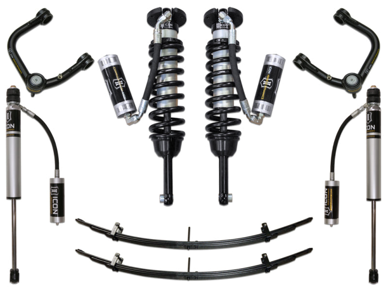 The ICON 05-15 Toyota Tacoma 0-3.5in/2016+ Toyota Tacoma 0-2.75in Stage 4 Suspension System with Tubular Upper Control Arms includes durable vehicle suspension components such as coilover shocks, leaf springs, and versatile upper control arms featuring Delta Joint technology. The components are symmetrically arranged and come with adjustable reservoirs to enhance performance, prominently displaying the ICON brand on the shocks.