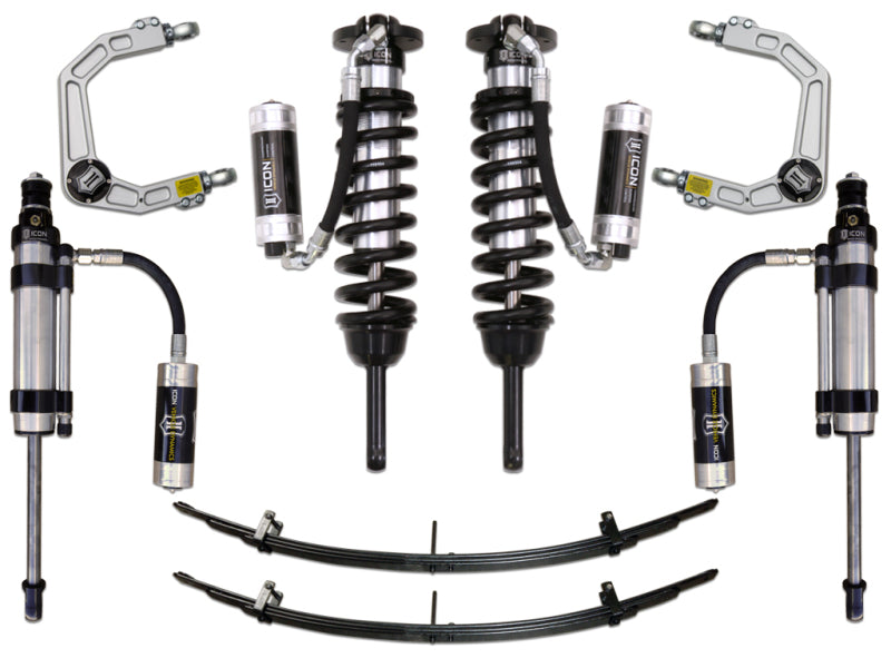 A set of ICON vehicle suspension components, designed for the 2005-2015 Toyota Tacoma (0-3.5 inches) and 2016+ Toyota Tacoma (0-2.75 inches), features two coilovers, remote reservoirs, and billet upper control arms with Delta Joint technology. These parts are symmetrically arranged on a white background to highlight their design and features.