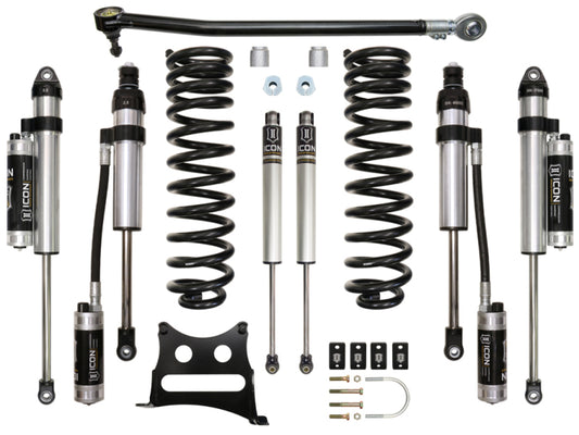 The ICON 2017+ Ford F-250/F-350 2.5in Stage 5 Suspension System from ICON includes expertly designed components like shock absorbers, coil springs, brackets, and bolts for your 4WD Ford Super Duty. Boost your off-road performance with this carefully organized kit displayed on a white background.