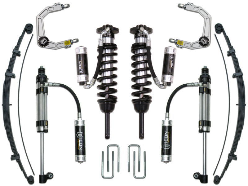 The ICON 05-15 Toyota Tacoma 0-3.5in/16-17 Toyota Tacoma 0-2.75in Stg 10 Suspension System w/Billet Uca comprises vehicle suspension components, including heavy-duty ball joints, billet aluminum control arms, coilover shocks, leaf springs, hydraulic bump stops, and the innovative ICON Delta Joint. These parts are symmetrically arranged against a white background.