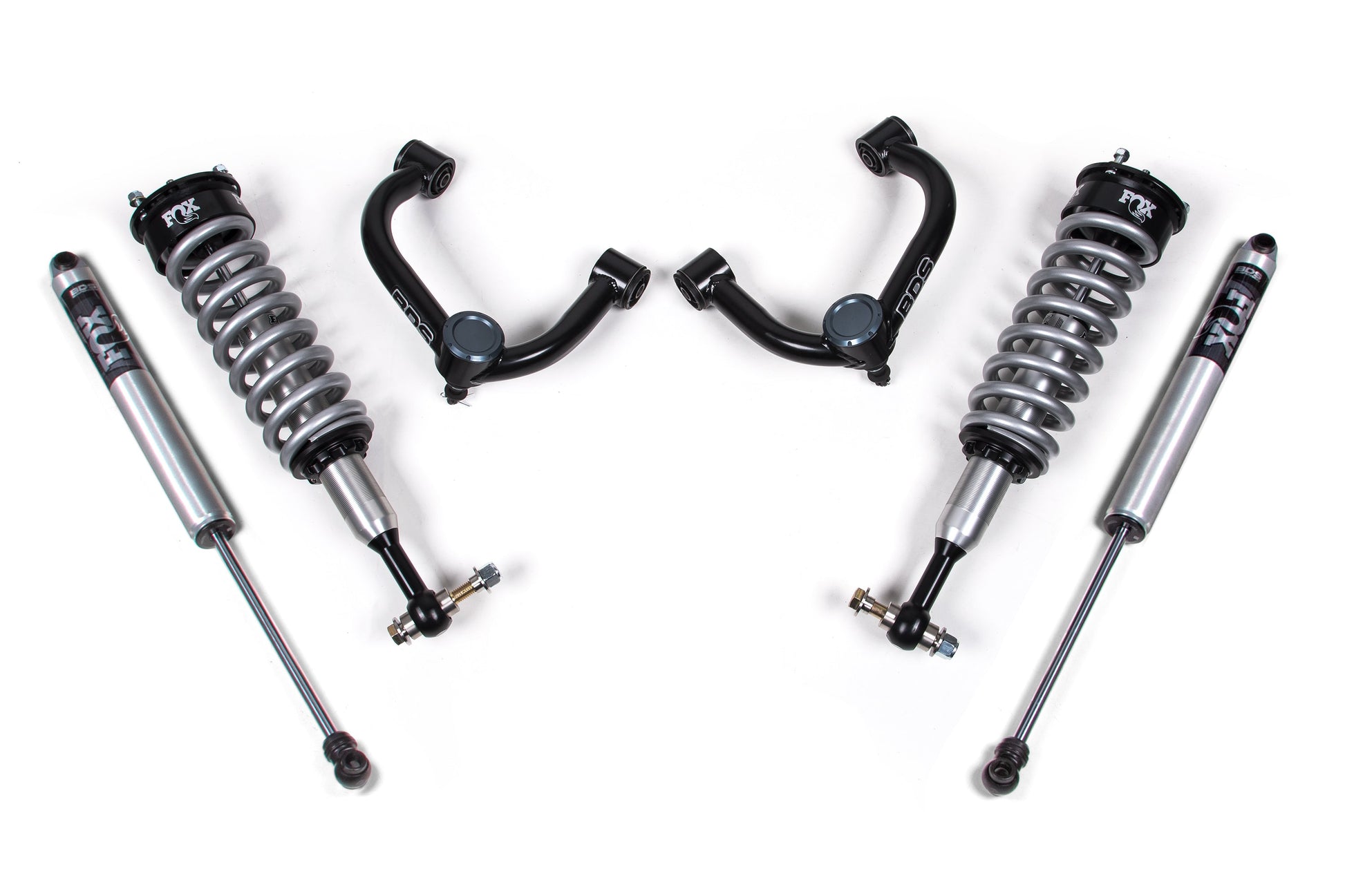 A set of BDS vehicle suspension components, designed symmetrically against a white background. The set, perfect for a Ford F150 leveling kit (2014-2020) 4WD, includes two FOX 2.0 coil-over shocks, two upper control arms, and two additional shocks. All parts showcase metallic and black finishes and are labeled "FOX.