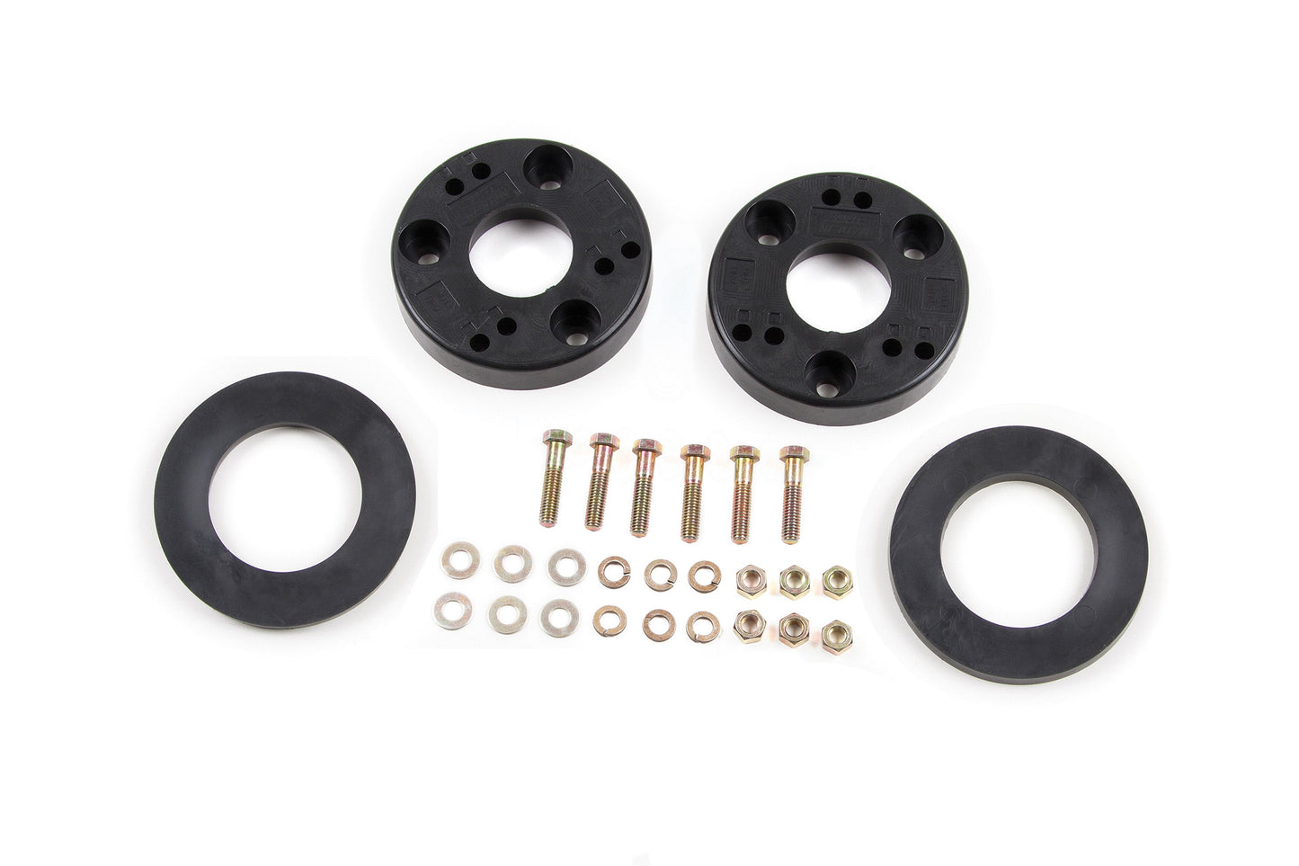 The image showcases the 2.5 Inch Leveling Kit for Ford F150 (09-20) 2/4WD by BDS, laid out on a white background. The kit features two black circular spacers with multiple holes, two black circular rings, several bolts, and a set of washers. All components are neatly arranged for display, perfect for enhancing your BDS suspension system or achieving a 2.5-inch lift.
