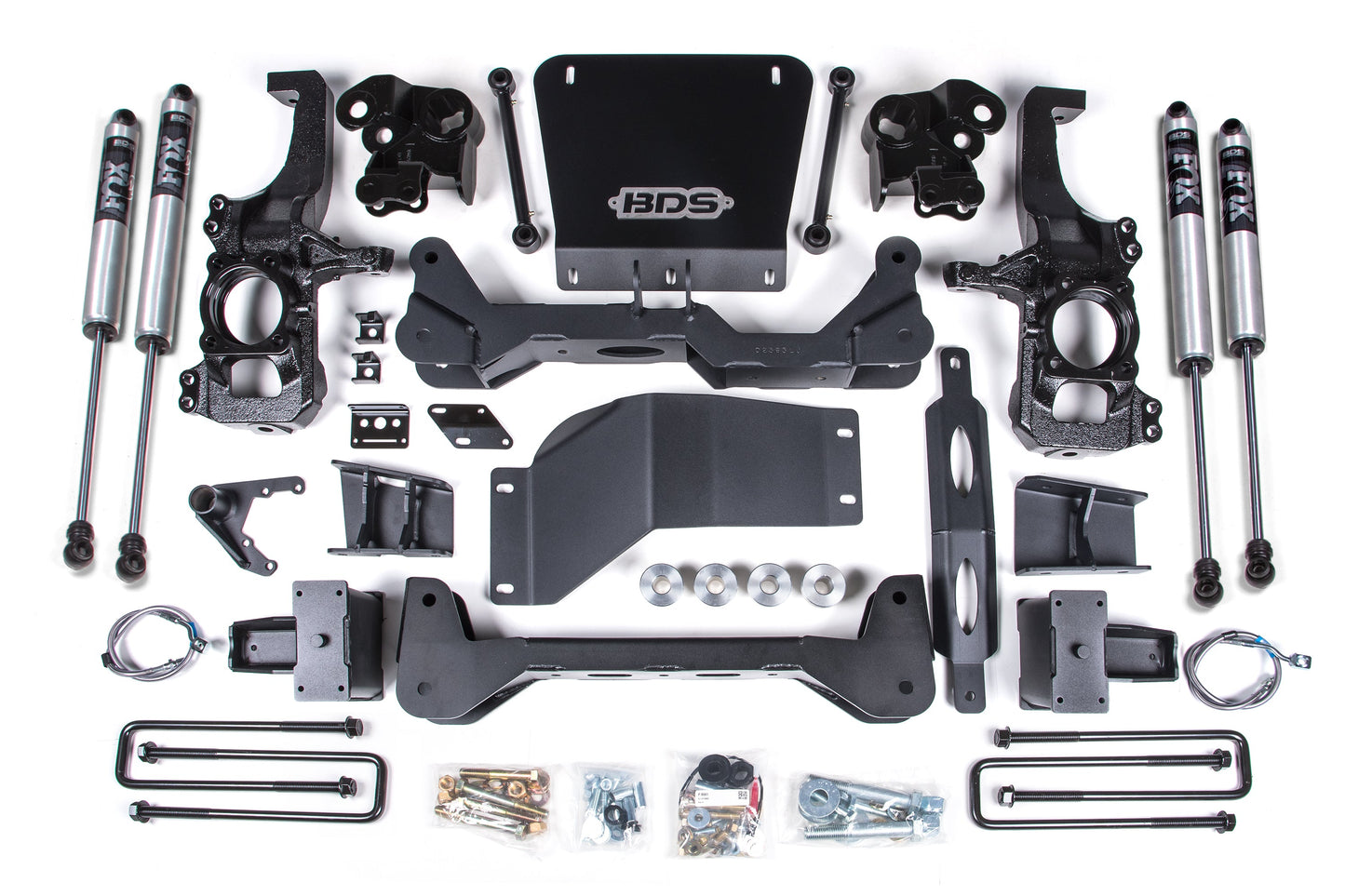 Image showcasing a 5 Inch Lift Kit designed for the Chevy Silverado or GMC Sierra 2500HD/3500HD (2020-2024) 4WD, featuring essential components such as shocks, brackets, bolts, and metal parts against a pristine white background. The prominent BDS logo is displayed on one of the main components.