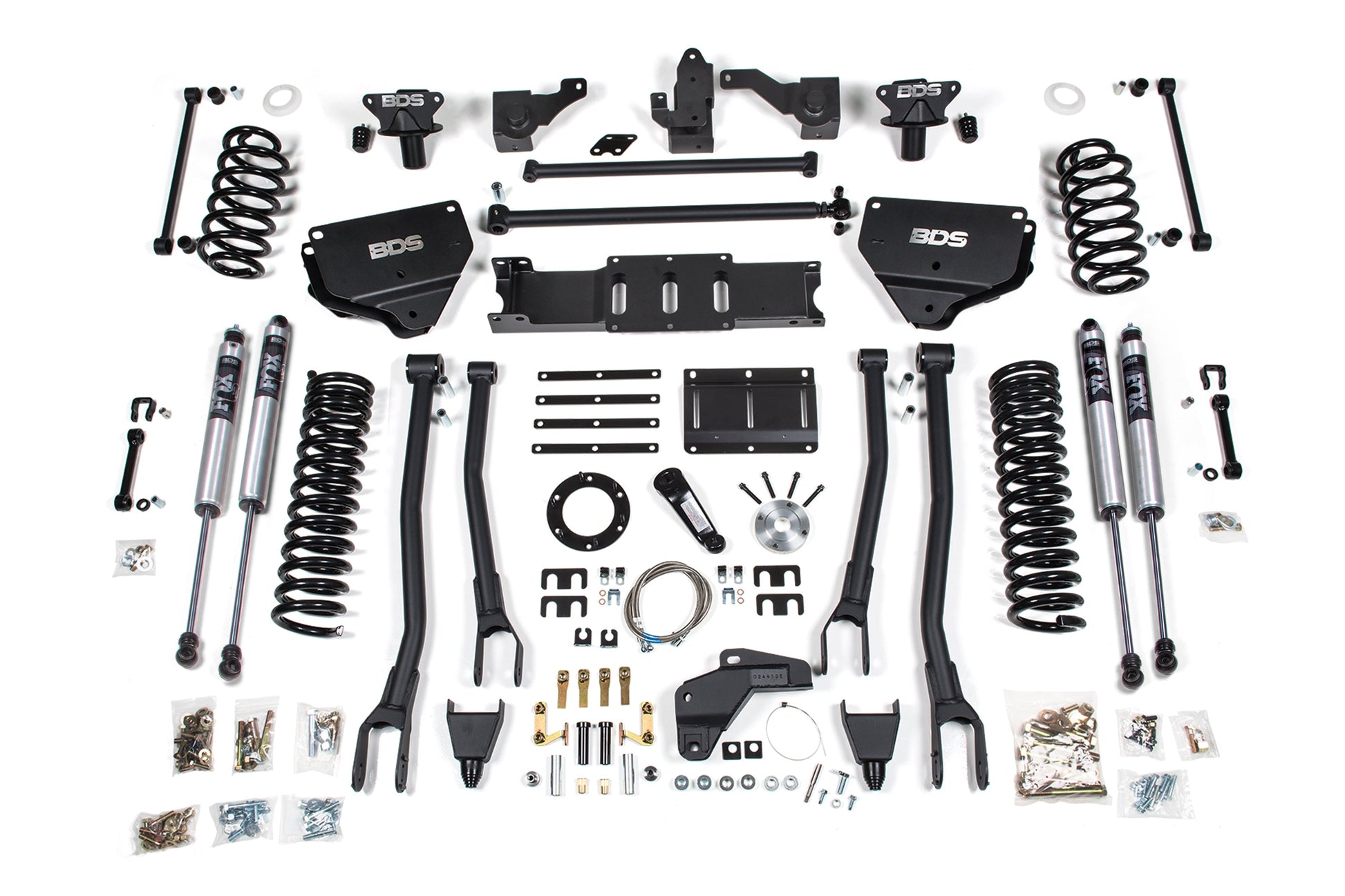 Image displaying the complete BDS 8 Inch Lift Kit W/ 4-Link for a 2014-2018 Diesel-Powered RAM 2500 4WD. The kit includes springs, shock absorbers, control arms, brackets, and various hardware pieces, all neatly arranged in an organized layout. The parts are primarily black and metallic in color, designed to achieve an impressive 8-inch lift on your truck.