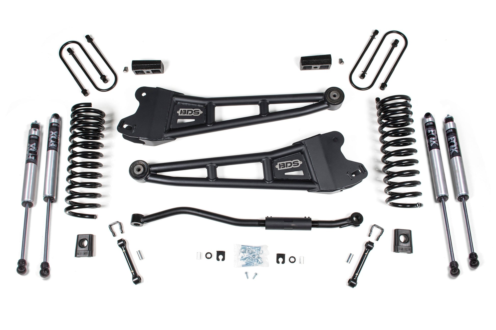 A comprehensive 3 Inch Lift Kit with Radius Arm for the Ram 3500 (model years 2019-2024) 4WD Diesel by BDS is spread out, including control arms, FOX 2.0 shocks, Pro-Ride coil springs, and various mounting hardware. The parts are primarily black and metallic with the "BDS" logo visible on some components. The kit is organized symmetrically.